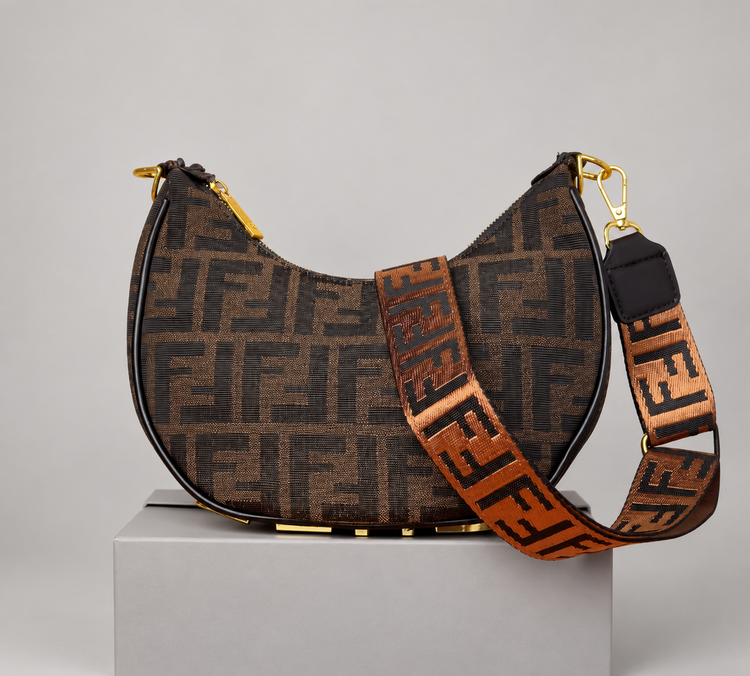 F464 brown monogram shoulder bag on neutral studio background